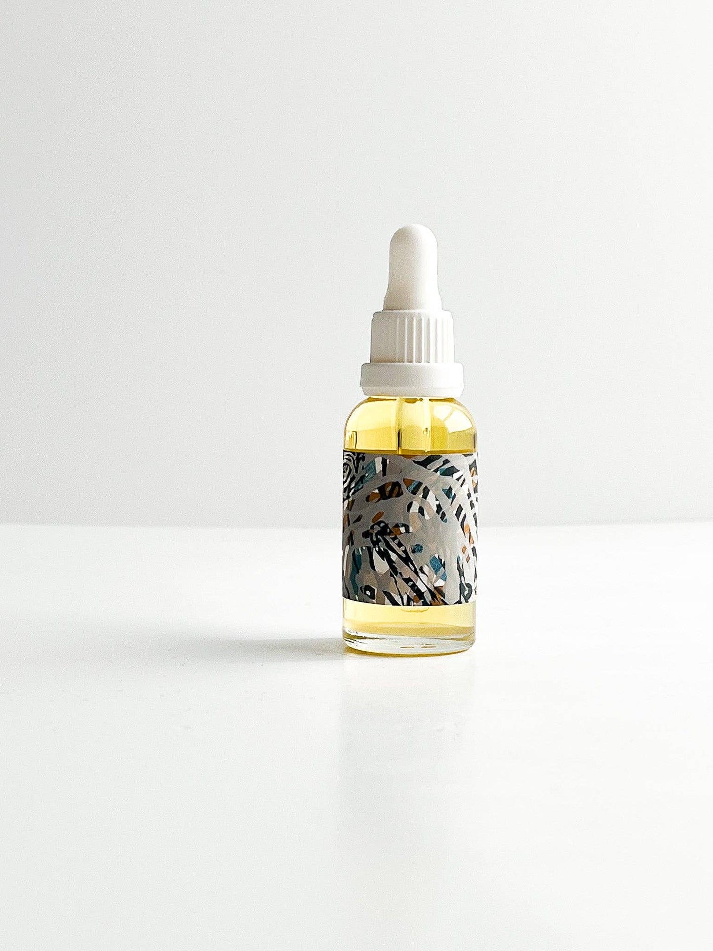 STUDIO BEIGE THE CURE universal face oil with rare emollients & botanical infusions